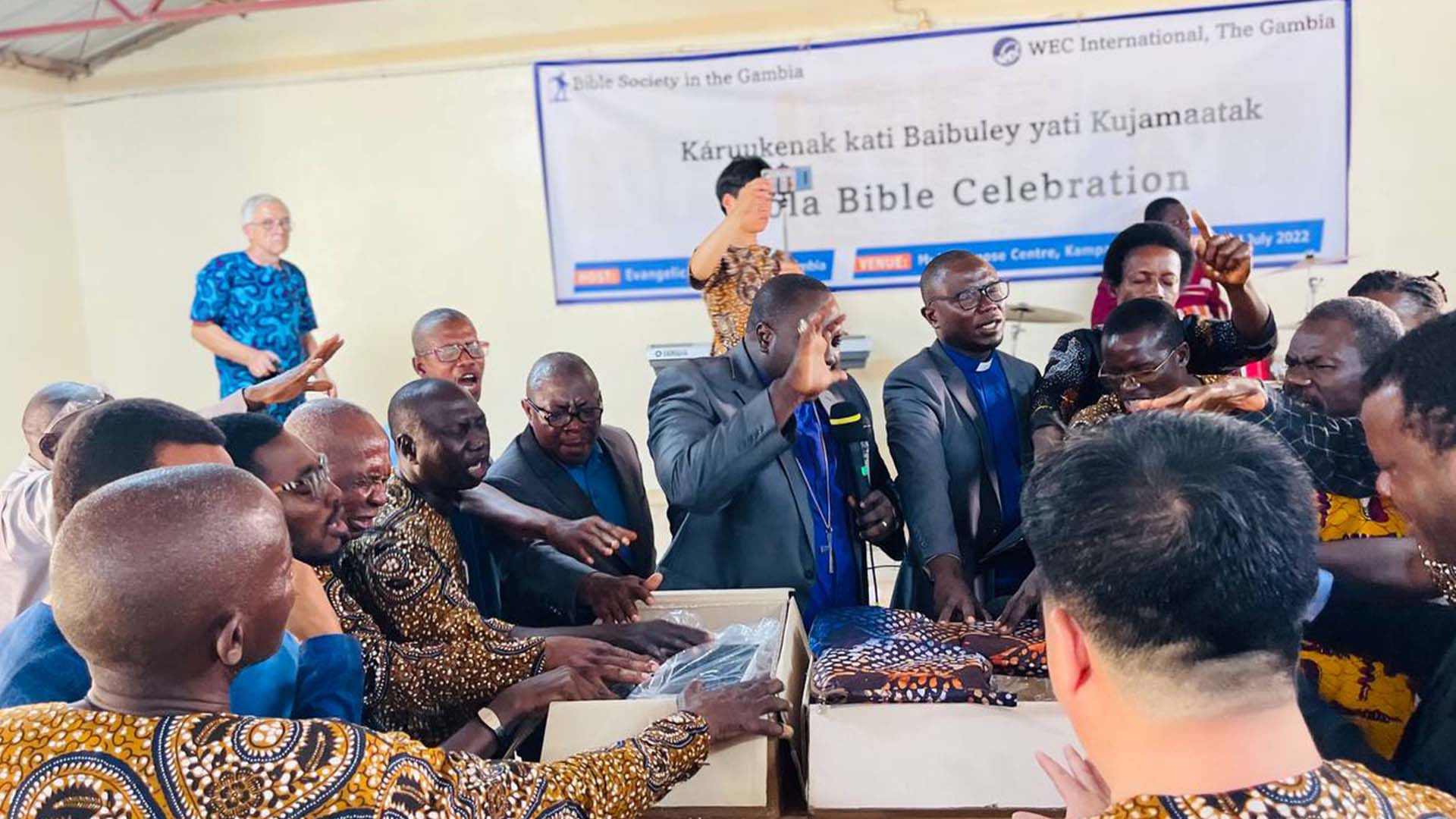 Songs of praise in The Gambia as the Jola people receive their Bible